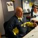 Michigan offensive coordinator Al Borges answers questions on air as defensive coordinator Greg Mattison looks on during a fundraiser for Mott Children's Hospital at the station on Friday. Melanie Maxwell I AnnArbor.com